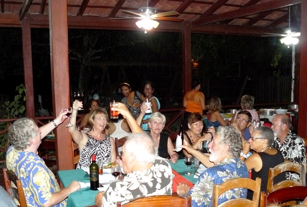 Guests lift a glass to toast the re-opening of Pinocchio's.