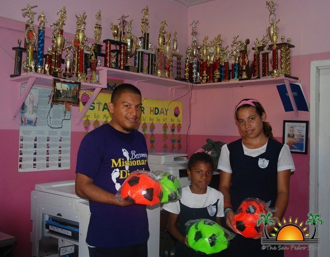 15-RC-School-receive-footballs-web