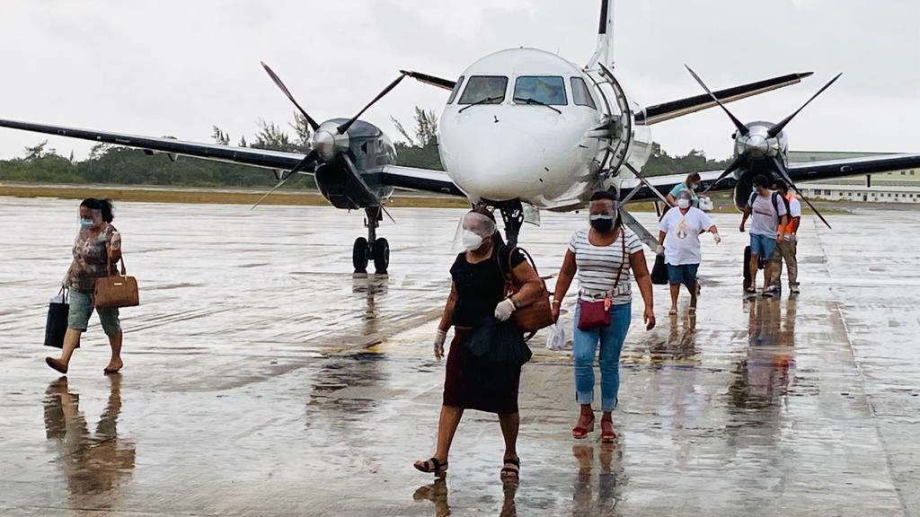Belizeans arriving