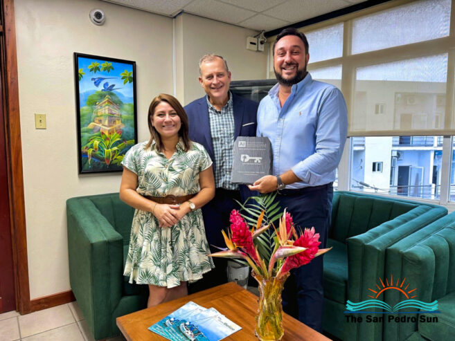 Luigi Wewege, Joel Nagel and Gladys Urbina receiving AI 2024 award on behalf of Caye International Bank Belize