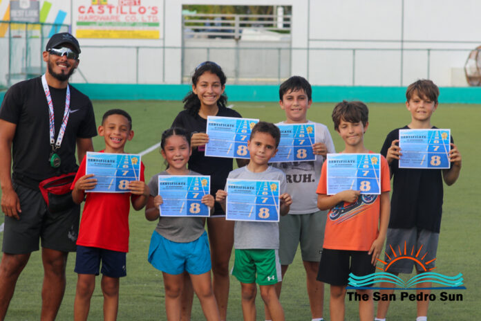 Young athletes take part in track and field time trials-05